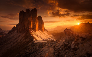 Mountain range sunset clouds rocks - a sunset in the background free wallpaper