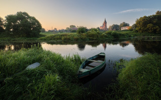 Small boat water church nature - a small boat free wallpaper
