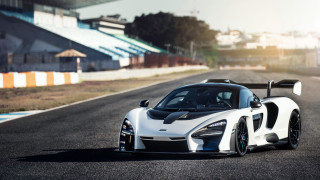White black sportscar racetrack sunshine - a sun free wallpaper