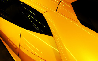 Yellow car black background white - a white car free wallpaper