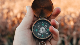 Person compass cornfield autumn blurry - a person holding free wallpaper