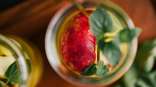 Glass apple leaves vanitas stilllife - a wooden table free wallpaper
