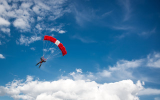 Paragliding cloudy day red parachute - panfuturism free wallpaper