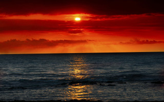 Sunset ocean red sky clouds - a sunset over the ocean free wallpaper