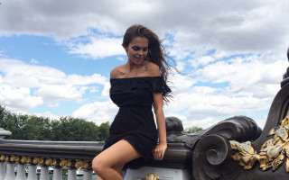 Woman black dress leaning railing - elina karimova free wallpaper