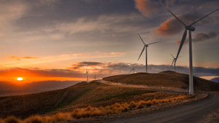 Wind turbines hill sunset road - a road free wallpaper for desktop