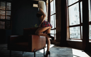 Woman sitting room white hair - a chair in a room free wallpaper