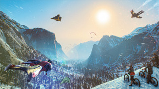 Snowy mountain biking kites landscape - a group of people riding free wallpaper