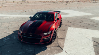 Red sports car black stripe 2 - a black stripe free wallpaper
