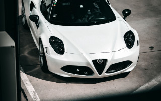White sports car clock building - detailed face free wallpaper