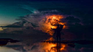 Person rock sky clouds fire - a cross free wallpaper