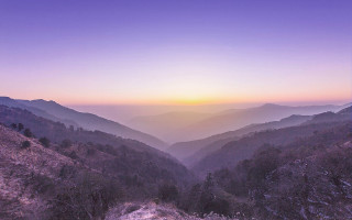Mountain range sunset purple sky - a purple sky above free wallpaper