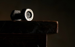 Metal object table dark background - a close up of a metal object free wallpaper