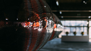 Large mirror ball building people - bruce munro free wallpaper