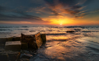 Sunset ocean wood beach puzzle - a sunset over the ocean free wallpaper