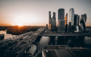 City bridge river sunset buildings - a few building free wallpaper
