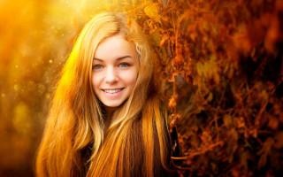 Woman blonde hair smiling autumn - leaf free wallpaper