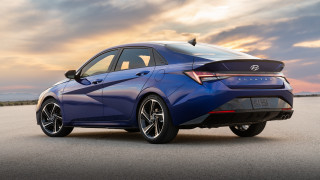 Blue car futurism sunset sideprofile - a sun setting free wallpaper