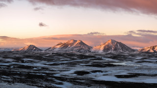 Mountain range snowy pink sky - panoramic free wallpaper for desktop