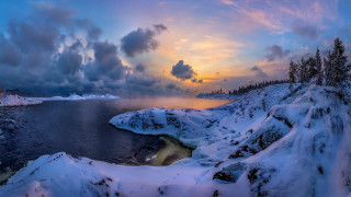 Sunset lake snow trees clouds 2 - a sunset over a lake free wallpaper