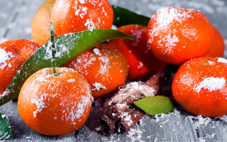 Orange powdered sugar table leaf - a pile of oranges free wallpaper