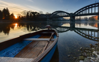 Boat bridge river sunset cityscape - a boat free wallpaper