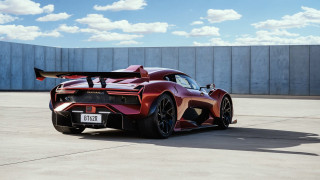 Red sports car parking lot 3 - side profile free wallpaper