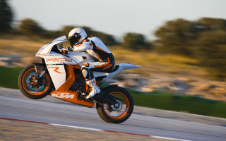 Motorcycle rider blurry background digital - a person riding free wallpaper