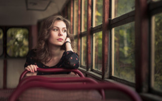 Bus woman looking out window - outside free wallpaper