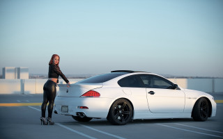 Woman white car parking lot - a sky background and a building in the background free wallpaper