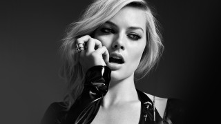 Surprised woman leather jacket black - a leather jacket free wallpaper