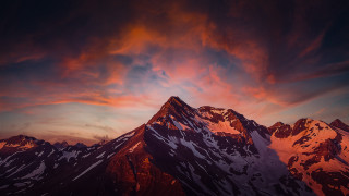 Mountain sunset clouds plane campfire - a sunset in the background free wallpaper