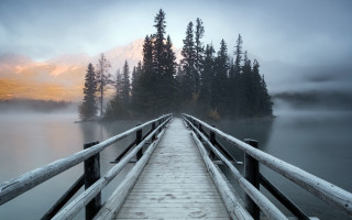 Wooden dock lake mountain forest - the background and a mountain range in the distance free wallpaper
