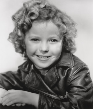 Curly girl leather jacket smile - free portrait wallpaper