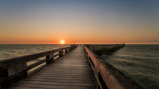Long pier sunset person bridge - the end free wallpaper
