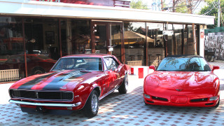 Red black cars building street - car free wallpaper