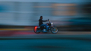 Man motorcycle street building clock - a man riding free wallpaper