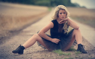 Woman sitting on tire outdoors - bettina heinenayech free wallpaper