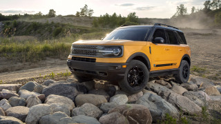 Yellow truck rocky forest hill - a yellow truck free wallpaper