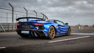Blue sports car track fence - a fence and a fenced in area free wallpaper