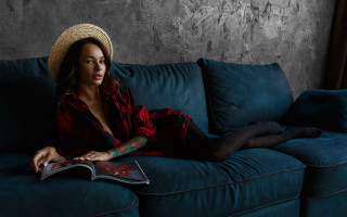 Woman couch hat book blue - daphne allen free wallpaper