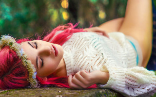Red hair woman sitting outdoors - a rock free wallpaper