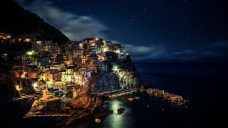 Cliff village night ocean bridge - a cliff above the ocean free wallpaper