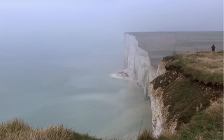 White cliff person outlook mountains - a cliff free wallpaper for desktop