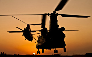 Helicopter sunset backlit military silhouette - a helicopter free wallpaper