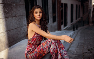 Woman sitting urban fashion floral - a city street free wallpaper