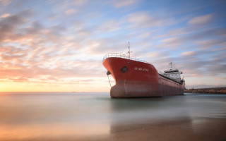 Red boat beach ocean sunset - dawn free wallpaper