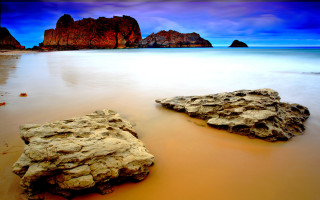 Rock formation beach blue sky - amir zand free wallpaper
