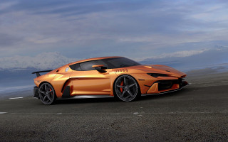 Orange sports car mountains cloudy - nice free wallpaper