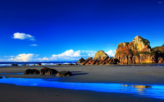 Beach rocks water blue sky - a beach free wallpaper for desktop